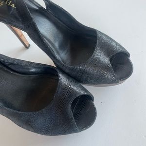 Cole Haan black open toe heels with Nike Air soles. Hardly worn.